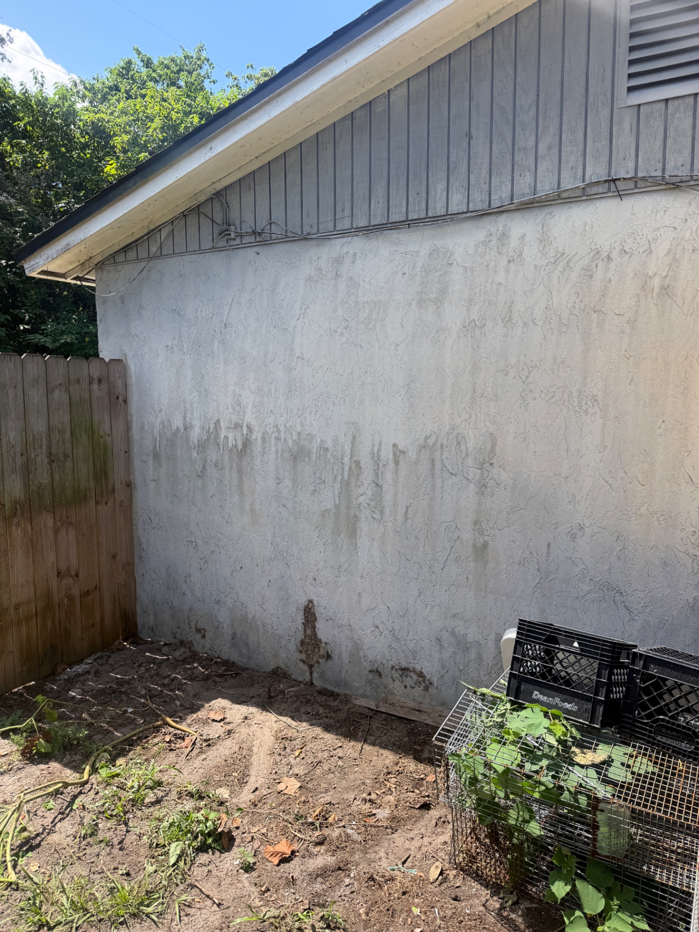 Same house corner after the pallets and debris were completely removed